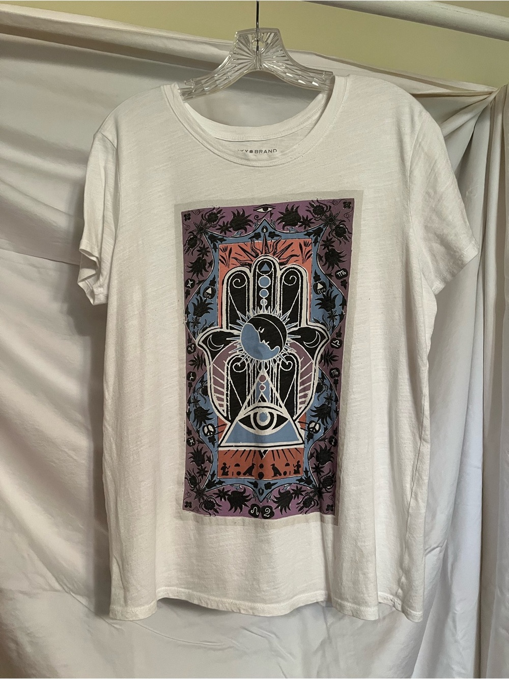 White Graphic Women’s Tee with Multicolor Hamsa Print